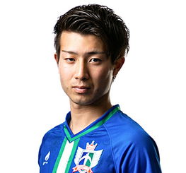 サッカーユニフォームを着た男性